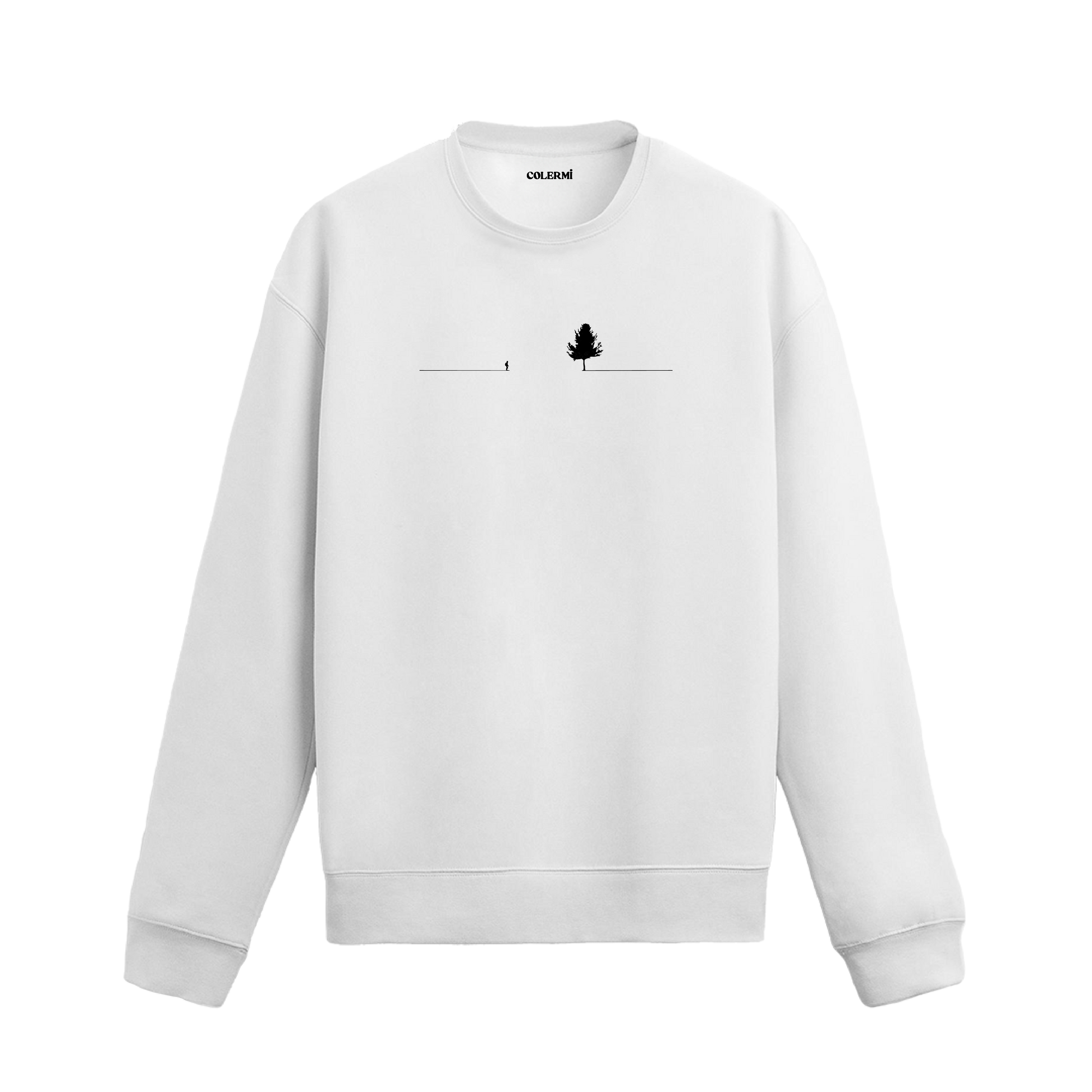 Yatay çizgi üzerinde yürüyen küçük bir insan figürü ve karşısında duran büyük ağaç çizimli sweatshirt tasarımı.