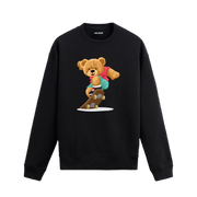 Kaykaycı ayıcık baskılı sweatshirt, eğlenceli tasarımı ve pamuklu kumaşıyla sokak stiline enerji katıyor.