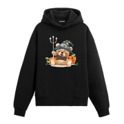 Cadı şapkası takmış, balkabaklarının önünde oturan sevimli ayıcık baskılı hoodie tasarımı.