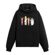 Sörf tahtalarıyla duran hayvan figürlü Colermi hoodie.