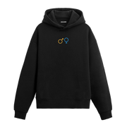 Siyah hoodie üzerinde kadın ve erkek sembolleri baskısı