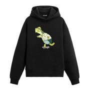 Kaykay süren, desenli gömlek ve gözlük takan kaplumbağa figürlü Colermi hoodie.