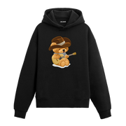 Kovboy şapkası takan ve gitar çalan sevimli ayıcık figürlü hoodie tasarımı.