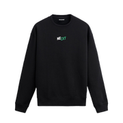 Siyah sweatshirt üzerinde yeşil ve beyaz renklerle yazılmış minimal “NEXT” tasarımı.