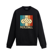 Renkli retro bloklar üzerinde pickleball topları baskılı siyah sweatshirt.